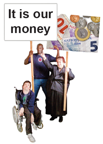 A group of people holding up signs. One of them says 