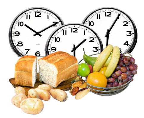 Three clocks showing morning, afternoon and evening times. In front of them is a selection of foods