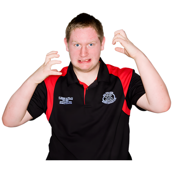 A person with their hands clenched and looking angry