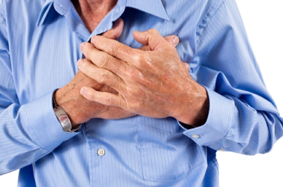 Close up of a man holding his hands against his chest