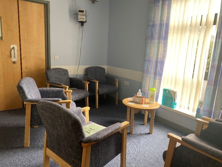 Refreshment area with 5 chairs and small table