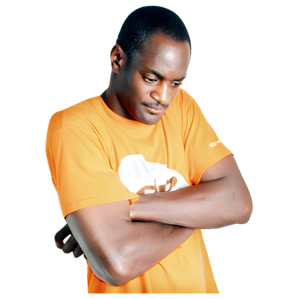 a man in a yellow tshirt with his arms folded who looks sad
