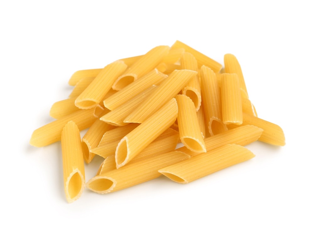 portion of dried pasta on white background