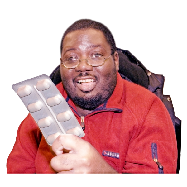 A person holding a medication dosing box