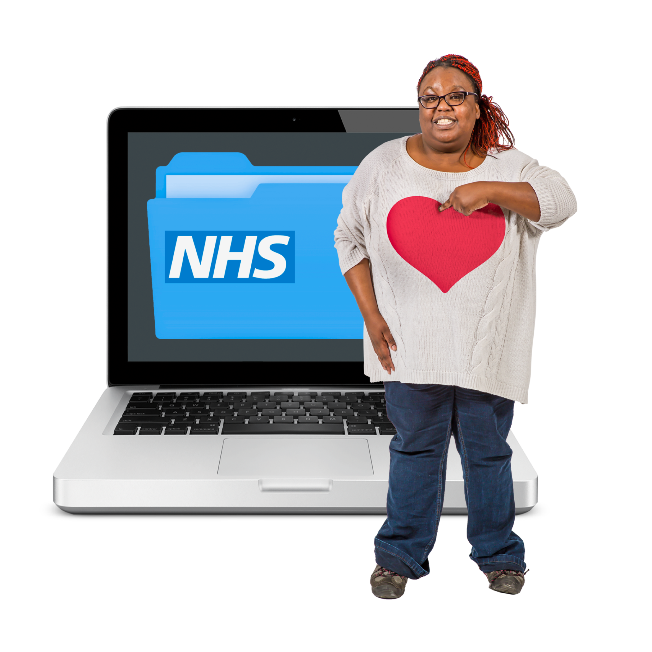 A woman is standing in front of a laptop with NHS records on the screen. She is pointing at herself.