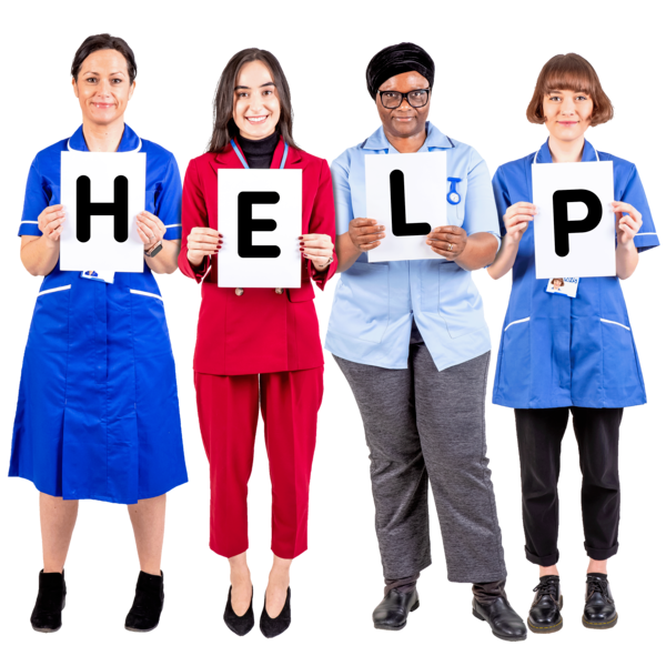 A group of people holding up letters that read 