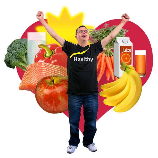 A person wearing a t-shirt with healthy written on the front. Around them is a range of healthy foods.