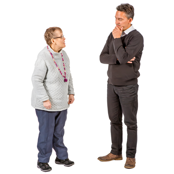 A woman and a man are talking while standing