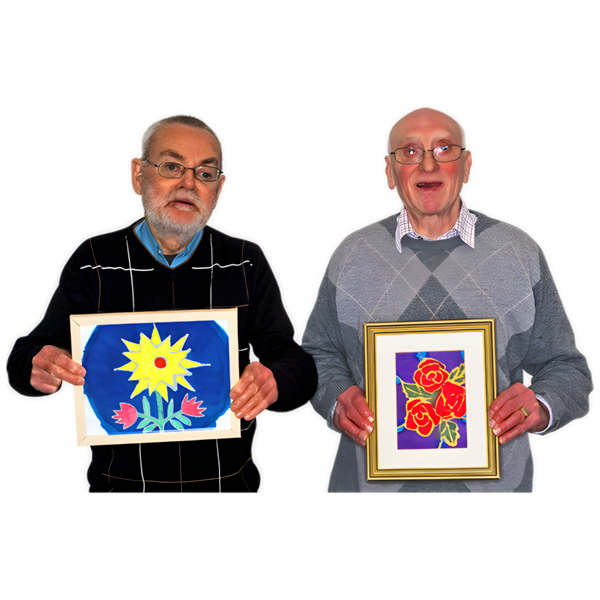 Two elderly men holding framed paintings of flowers.