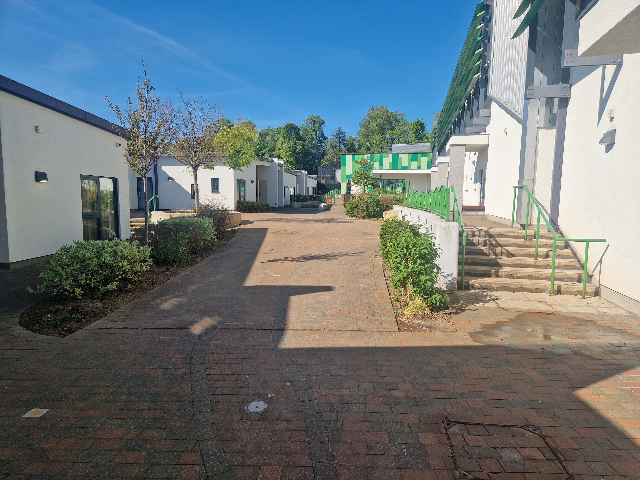 A photo of the inside of Ferndene groups. The main building is in the distance.