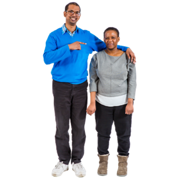 Two people next to each smiling. Once of them has their arm around the other.