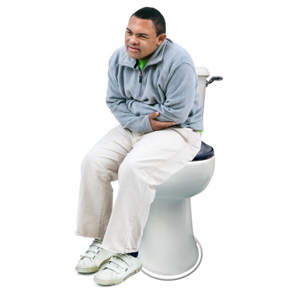 A man sitting on a toilet with a strained face