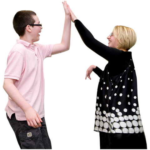 A boy and a woman touching hands in a high five action