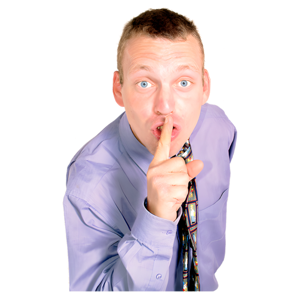 Man in a dress shirt and tie making a shushing gesture with his finger over his lips.