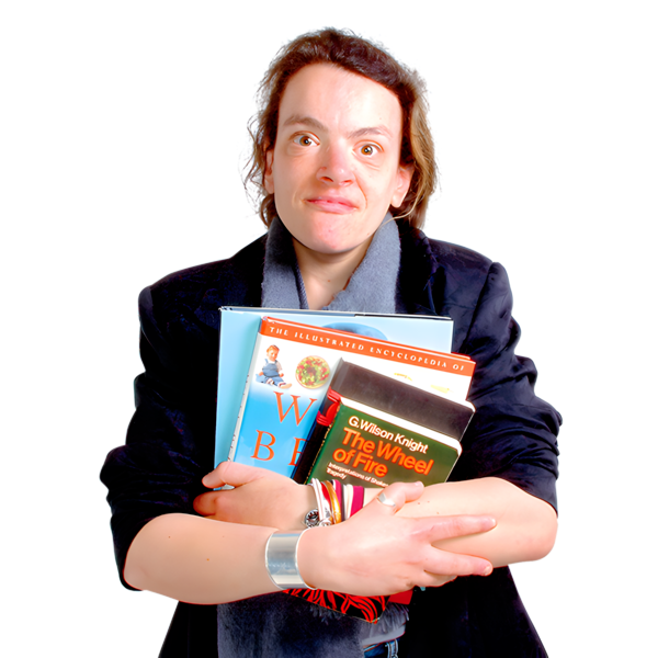 A person holding books and leaflets in their arms