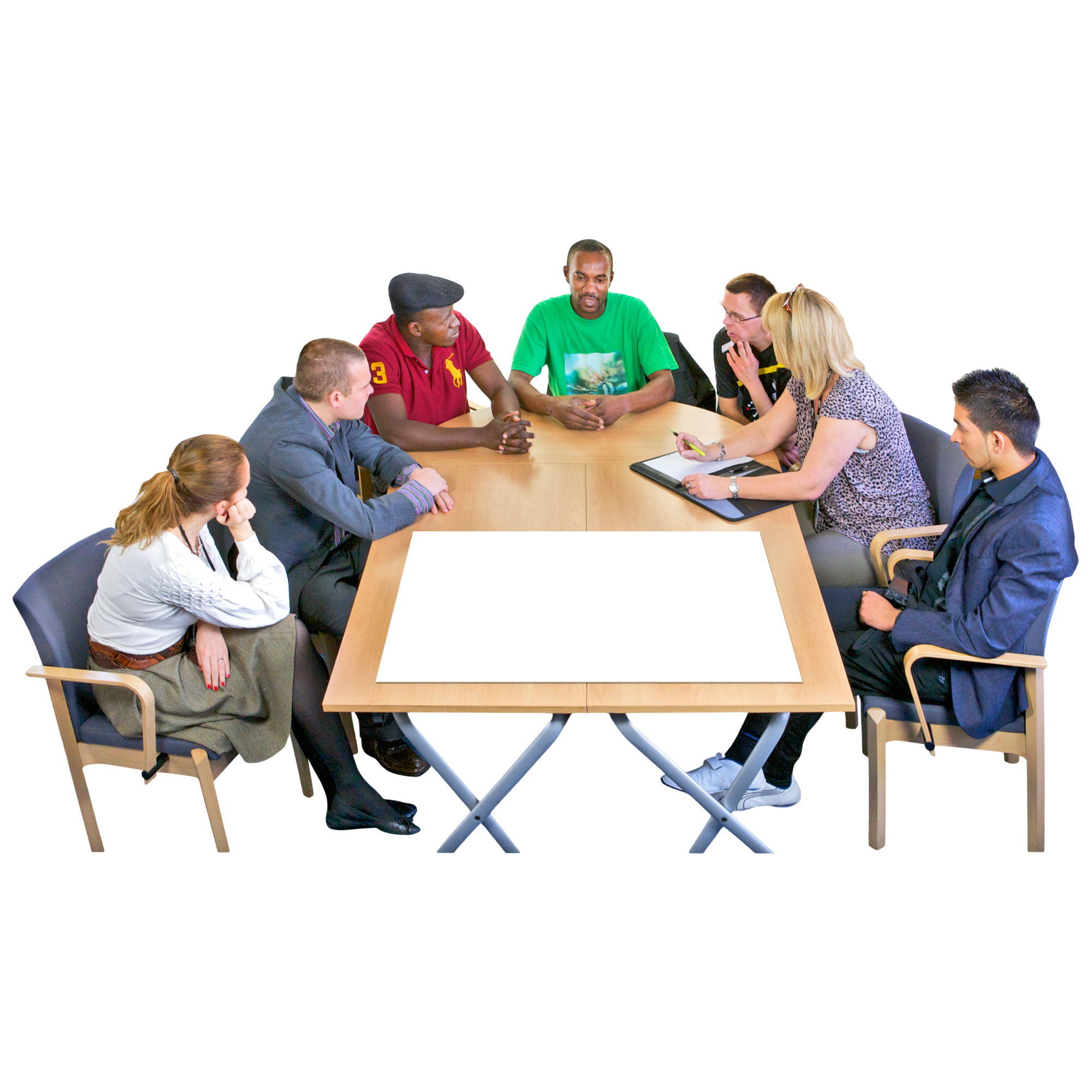 A group of seven people having a discussion around a wooden table.