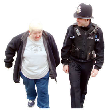 A police officer walking next to someone else