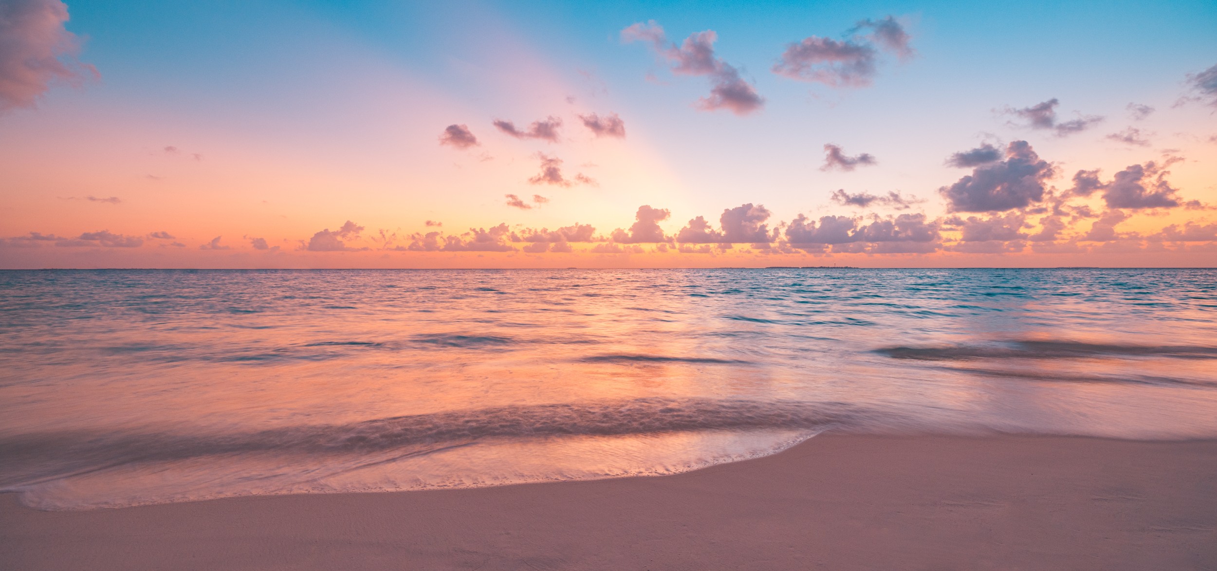 Peaceful closeup sea sand sky beach. Beautiful tranquil nature landscape