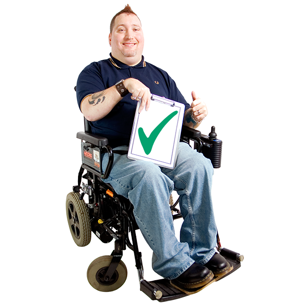 Person in a wheelchair holding a clipboard with a green check mark, smiling and giving a thumbs-up.