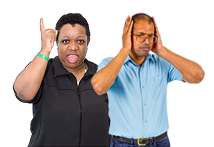A person shouting at another person who is covering their ears with their hands
