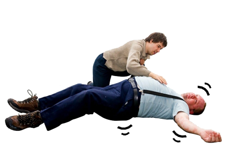 A person lying on the floor with hand drawn black curvy lines around the outside of the body to show movement. Another person is kneeling beside them with their hand on the persons chest.