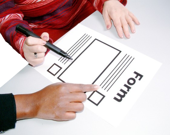 Someone filling in a form