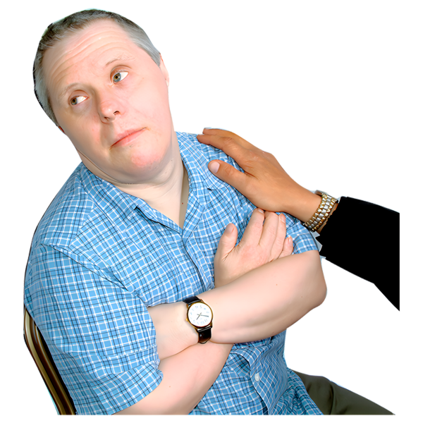 A man with his arms crossed and looking sad. There is a close up of another persons hand resting on his shoulder.