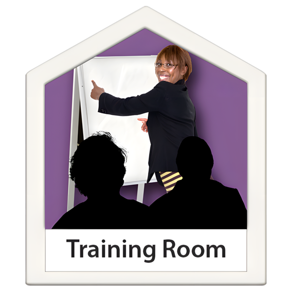A woman standing in front of a large flip pad and talking to people